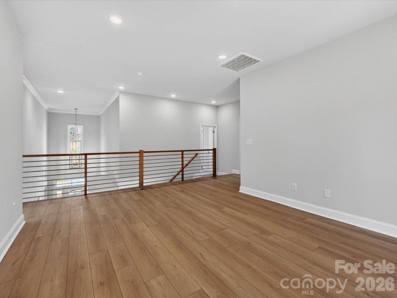 Spacious, unfurnished interior of a new home in North Creek Village, Huntersville (Image 39).