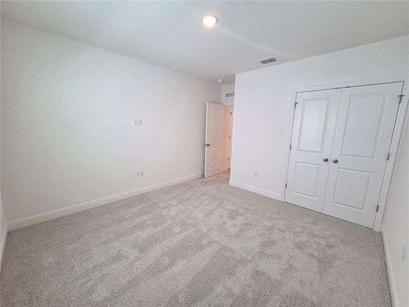Spacious, unfurnished interior of a new home in Villamar, Winter Haven (Image 32).