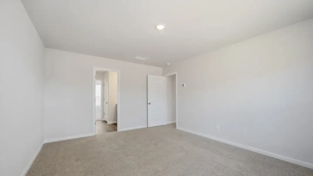 Representative unfurnished interior of a home built from the Brandon by D.R. Horton in Walden Ridge, Macon (Image 22).