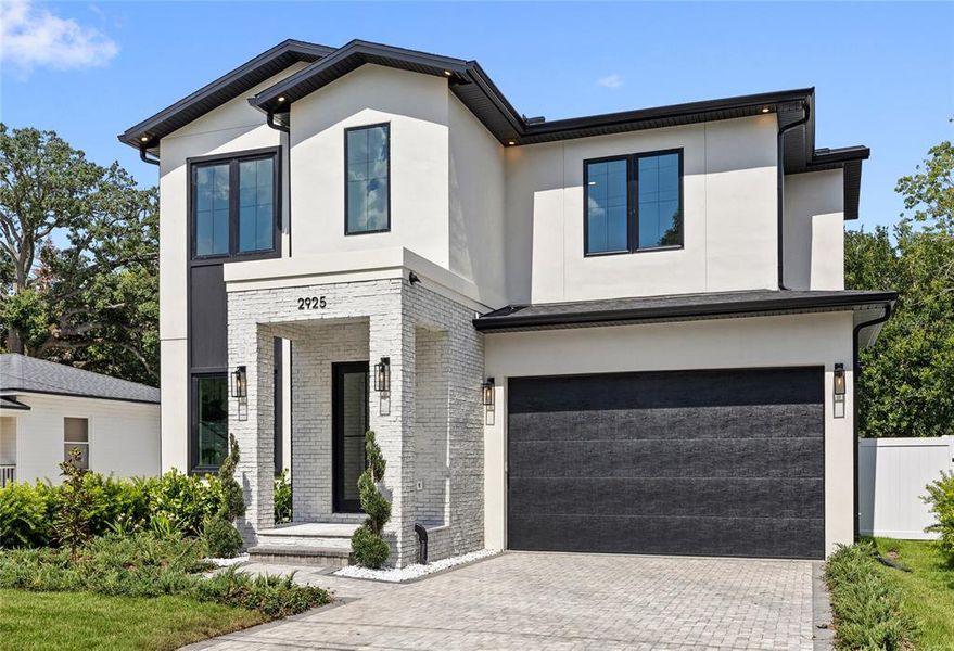 Front exterior of a new home in , Orlando, FL, highlighting curb appeal (Image 34).