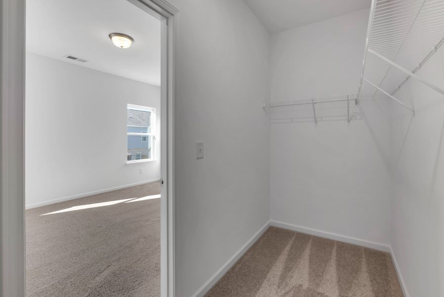 Large walk in closet in owner's bedroom