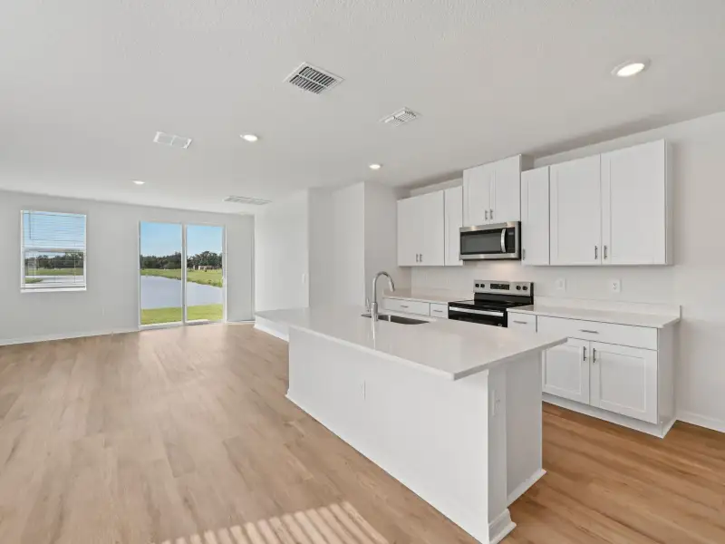 Furnished interior view inside a new home in Salt Meadows - Premier Series, Parrish (Image 3).