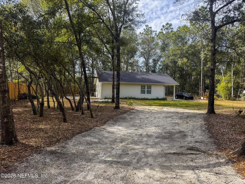 Exterior details and patio area of a home in , Melrose (Image 19). Exterior details and patio area of a home in , Melrose (Image 19).