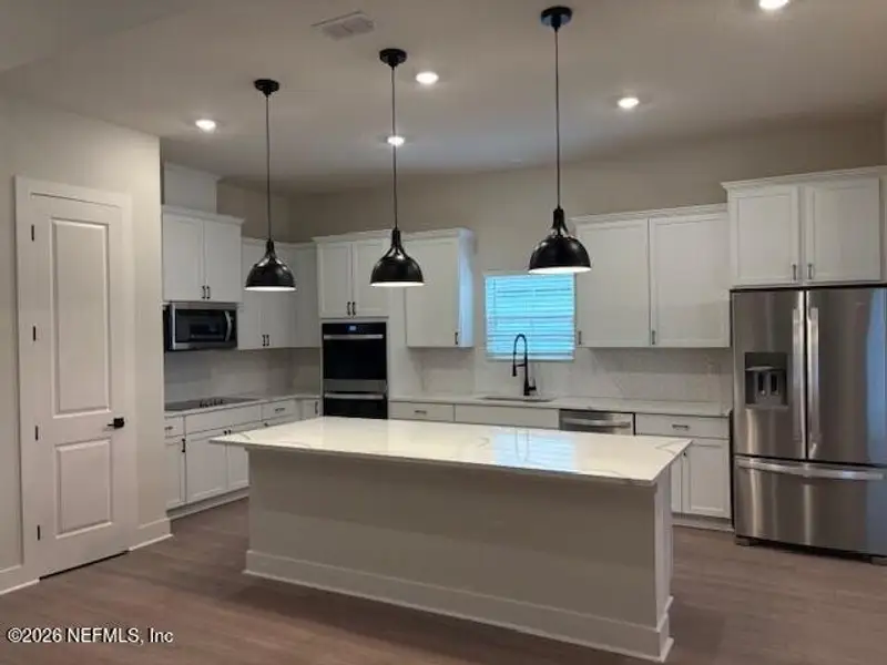 Furnished interior view inside a new home in Stables at Cary Forest, Bryceville (Image 3). Furnished interior view inside a new home in Stables at Cary Forest, Bryceville (Image 3).