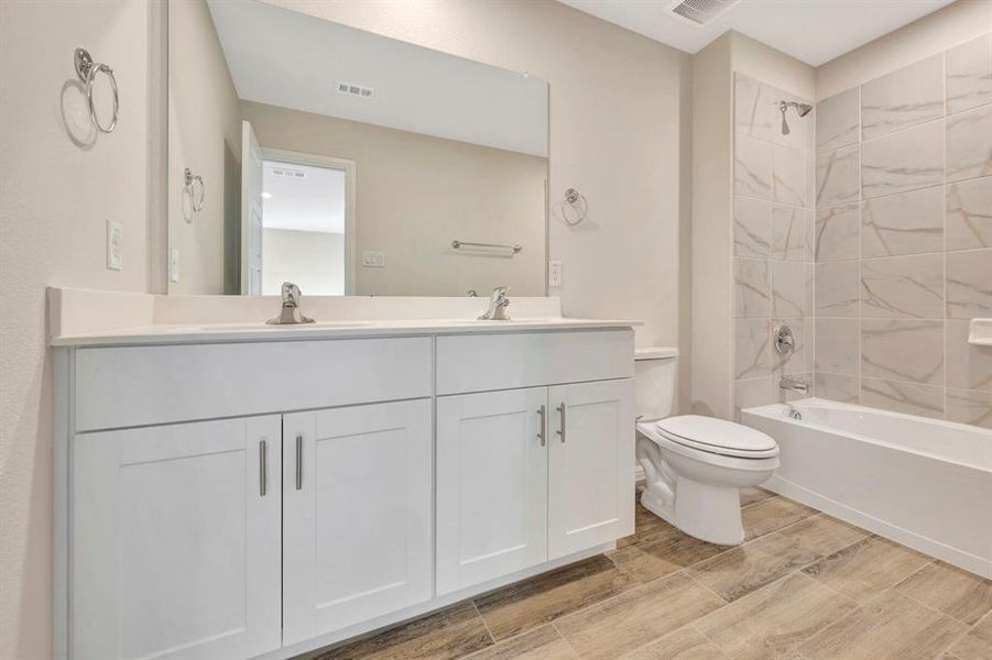 Furnished interior view inside a new home in The Preserve, Justin (Image 14).