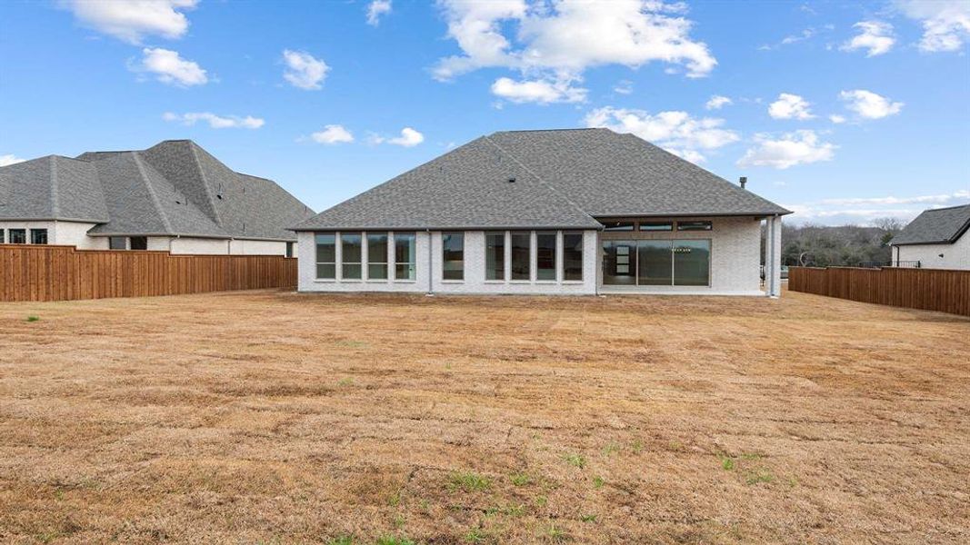 Exterior details and patio area of a home in Lakewood Village, Lakewood Village (Image 3).