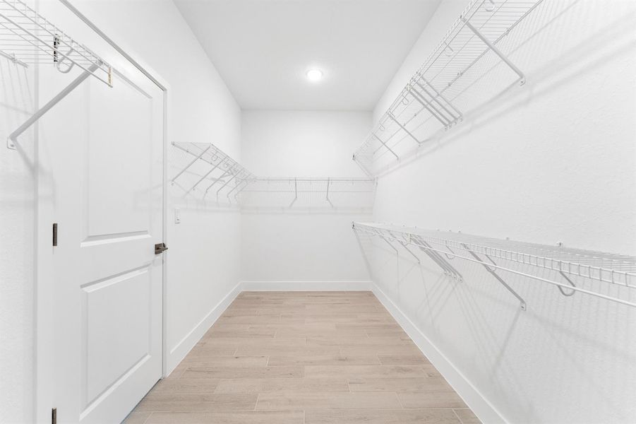 Primary Walk-in Closet Primary Walk-in Closet