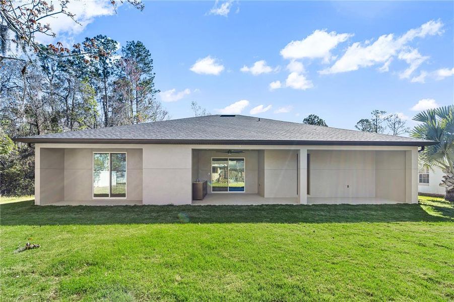 Front exterior of a new home in , Palm Coast, FL, highlighting curb appeal (Image 26).