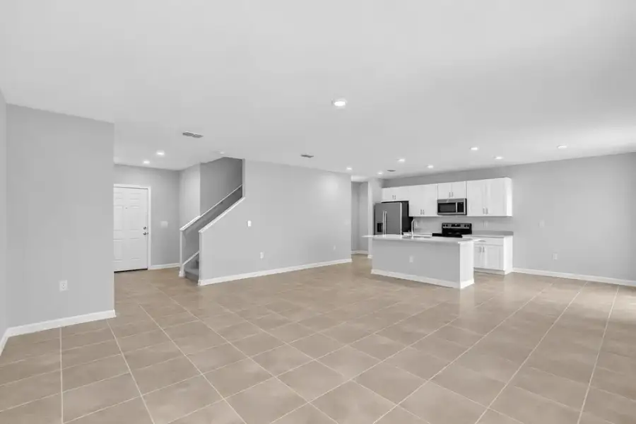 Representative unfurnished interior of a home built from the Dove by Taylor Morrison in Azure at Solaeris, Port St. Lucie (Image 25).