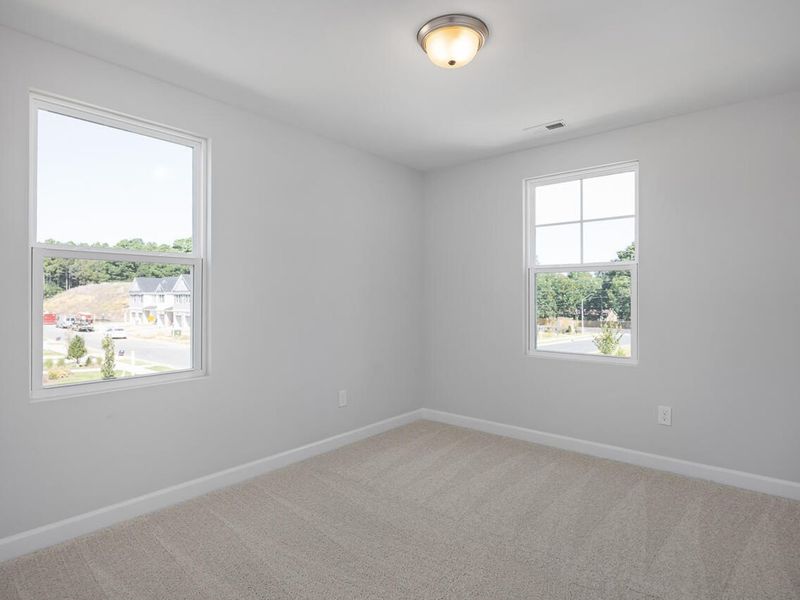 Spacious, unfurnished interior of a new home in Springvale, Fuquay Varina (Image 31).