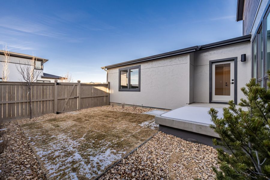 Exterior details and patio area of a home in West Grange, Longmont (Image 25).