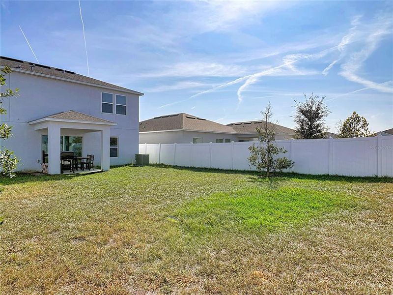 Exterior details and patio area of a home in Parkside at Cherry Lake, Groveland (Image 4).