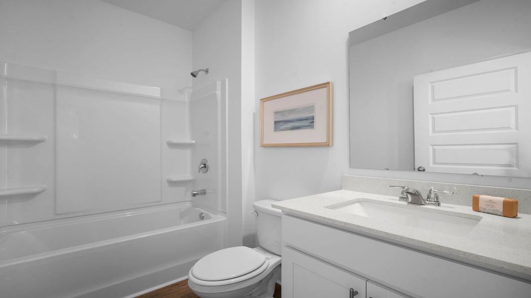 Furnished interior view inside a new home in The Lakes at North Glynn, Brunswick (Image 27).