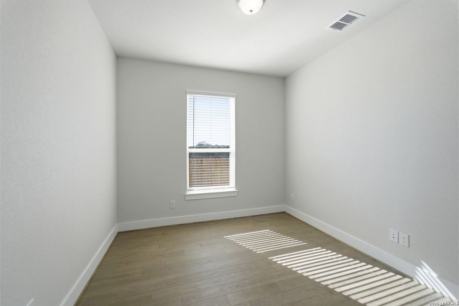 Spacious, unfurnished interior of a new home in The Woodlands at Medina Hills, Mico (Image 33).