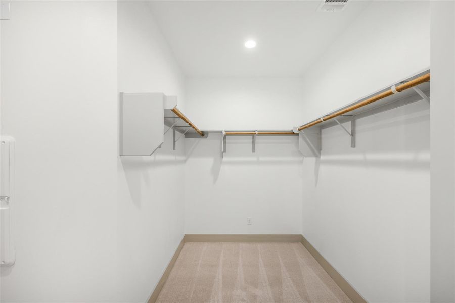 1/2 of the large primary closet 1/2 of the large primary closet