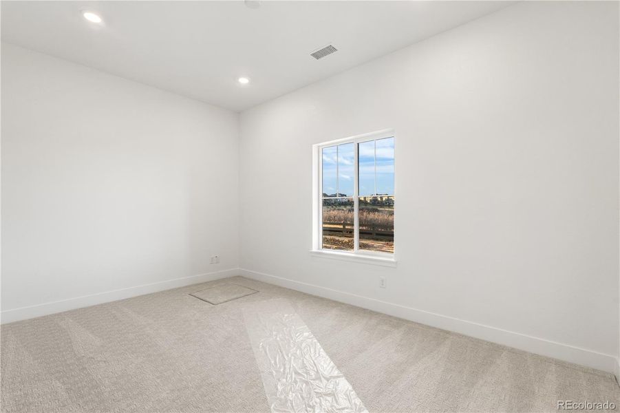 Spacious, unfurnished interior of a new home in Luxe at The Canyons, Castle Pines (Image 22).