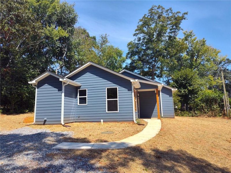 Front exterior of a new home in , Cumming, GA, highlighting curb appeal (Image 11). Front exterior of a new home in , Cumming, GA, highlighting curb appeal (Image 11).