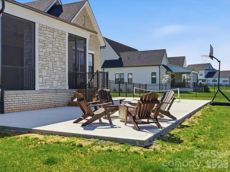 Exterior details and patio area of a home in Broadmoor at Marvin, Marvin (Image 4).