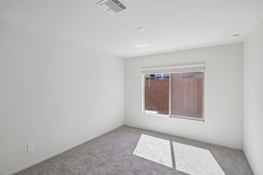 Spacious, unfurnished interior of a new home in The Landings at Rancho Del Lago, Vail (Image 11).