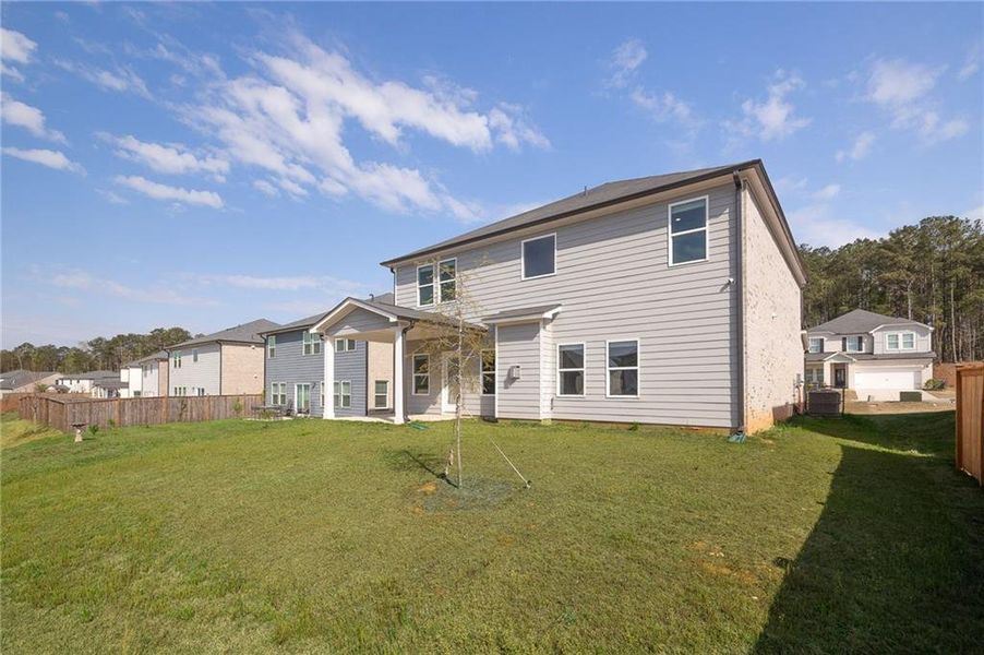 Exterior details and patio area of a home in , Fairburn (Image 3).