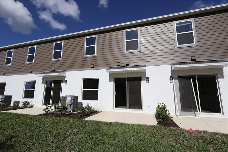 Exterior details and patio area of a home in Tyson Ranch, Orlando (Image 3). Exterior details and patio area of a home in Tyson Ranch, Orlando (Image 3).