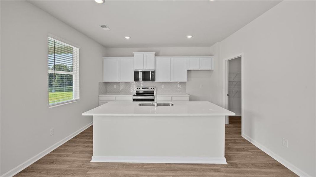 Furnished interior view inside a new home in Poplar Preserve, Newnan (Image 5). Furnished interior view inside a new home in Poplar Preserve, Newnan (Image 5).