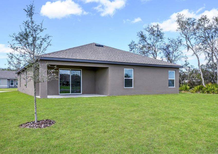 The back patio has a sliding glass door leading into the family room