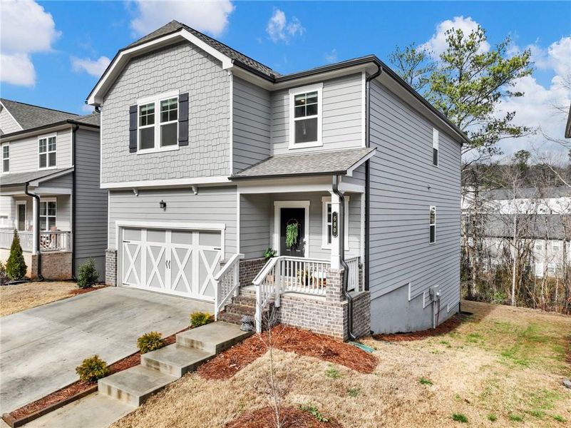 Exterior details and patio area of a home in Creekside at Farmers Crossing, Ball Ground (Image 21). Exterior details and patio area of a home in Creekside at Farmers Crossing, Ball Ground (Image 21).