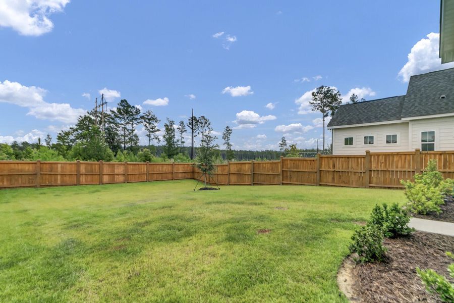 Exterior details and patio area of a home in Midtown at Nexton, Summerville (Image 30).