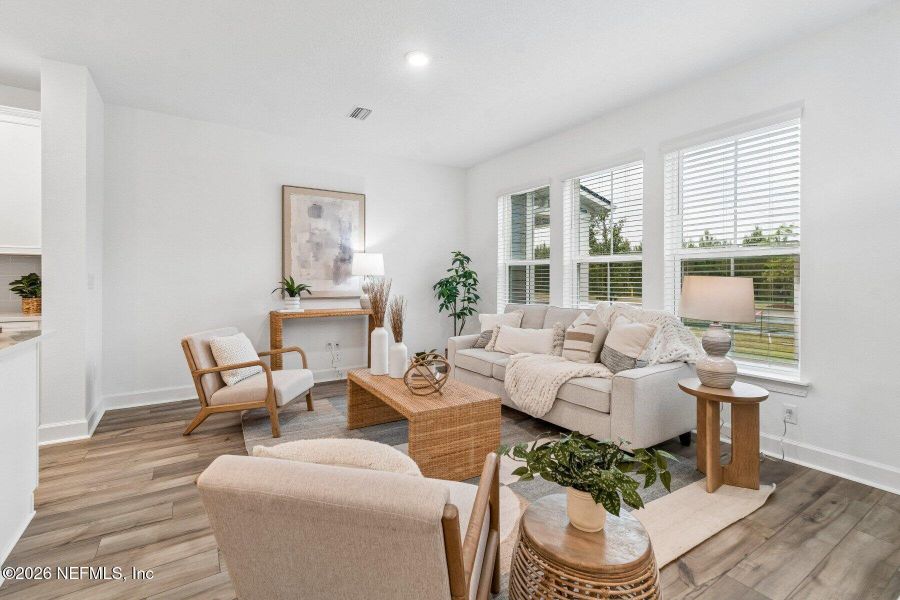 Furnished interior view inside a new home in Westerly Park at Wildlight - Courtyard Collection, Yulee (Image 10).