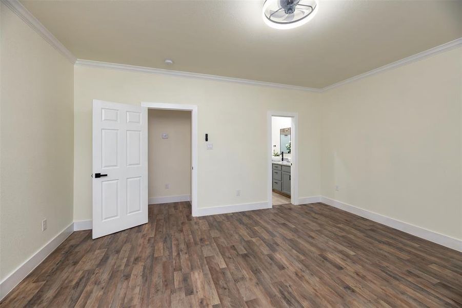 Plenty of room for a kingsized bed in this primary bedroom