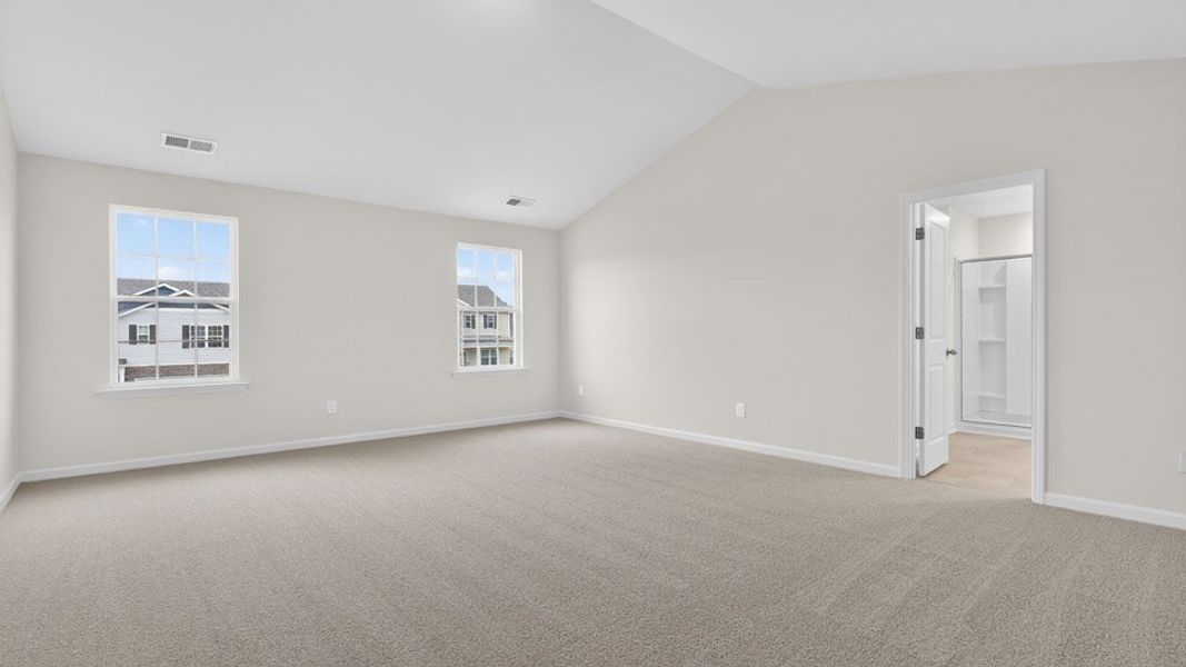 Spacious, unfurnished interior of a new home in Gretchen Pines, West End (Image 26).