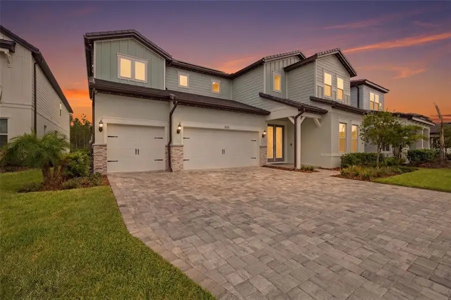 Front exterior of a new home in , Zephyrhills, FL, highlighting curb appeal (Image 1). Front exterior of a new home in , Zephyrhills, FL, highlighting curb appeal (Image 1).