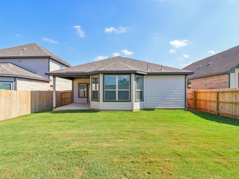 Exterior details and patio area of a home in Kallison Ranch, San Antonio (Image 18).