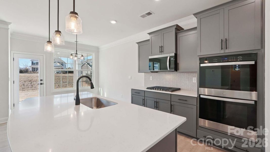 Furnished interior view inside a new home in Sylvan Creek, Denver (Image 6).