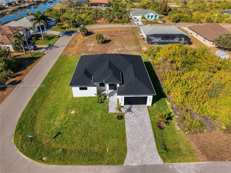 Front exterior of a new home in , Port Charlotte, FL, highlighting curb appeal (Image 28).