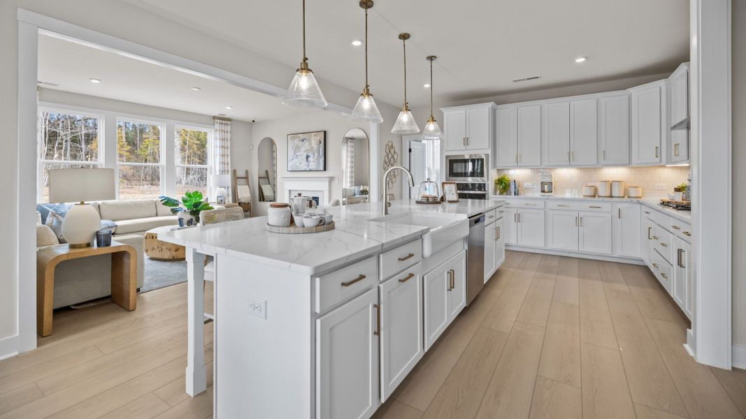 The Stonefield Home Plan in Michaux Garden by DRB Homes in Belmont, NC. -Kitchen
