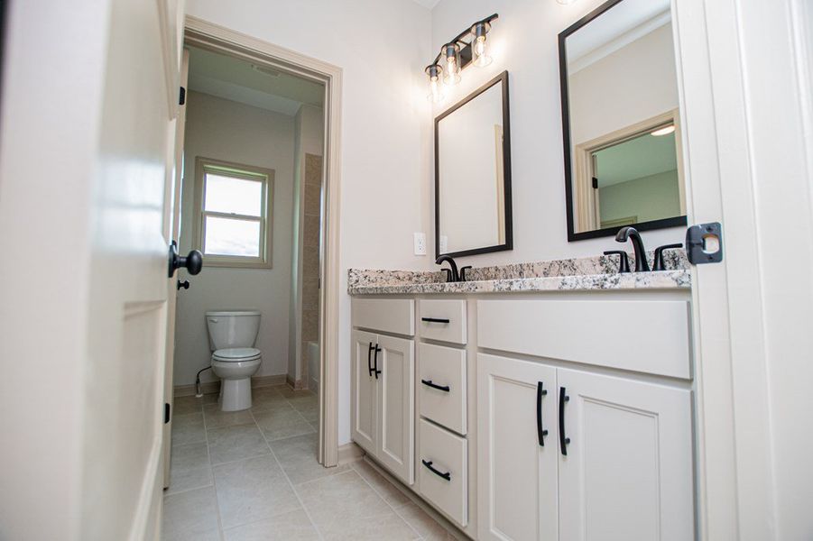 Furnished interior view inside a new home in WOODMONT RESERVE, Roopville (Image 17).