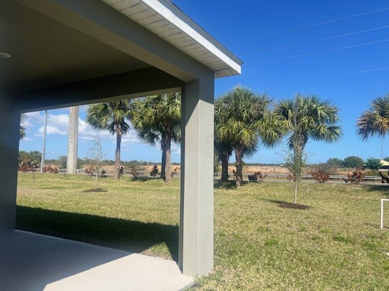 Exterior details and patio area of a home in Lakes At St Sebastian, Micco (Image 3).