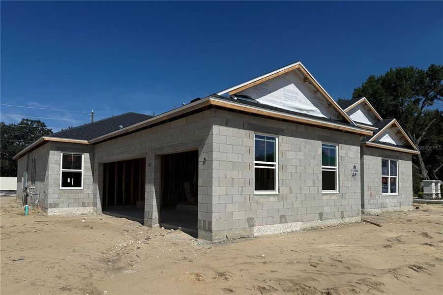 Front exterior of a new home in Willow Run, Apopka, FL, highlighting curb appeal (Image 19). Front exterior of a new home in Willow Run, Apopka, FL, highlighting curb appeal (Image 19).