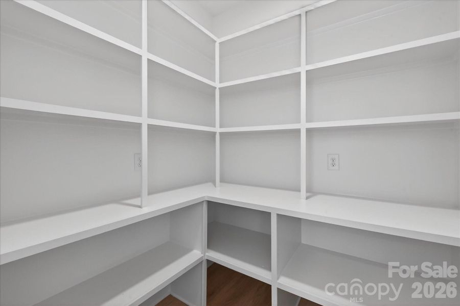 Generous Walk-In Pantry w/Wooden Shelving