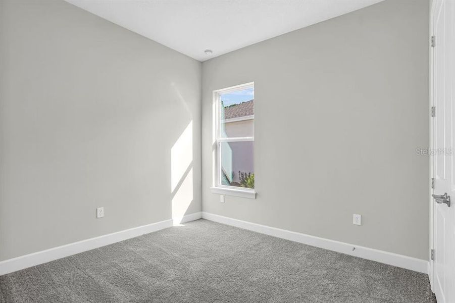 Spacious, unfurnished interior of a new home in Esplanade at Center Lake Ranch, St. Cloud (Image 19).