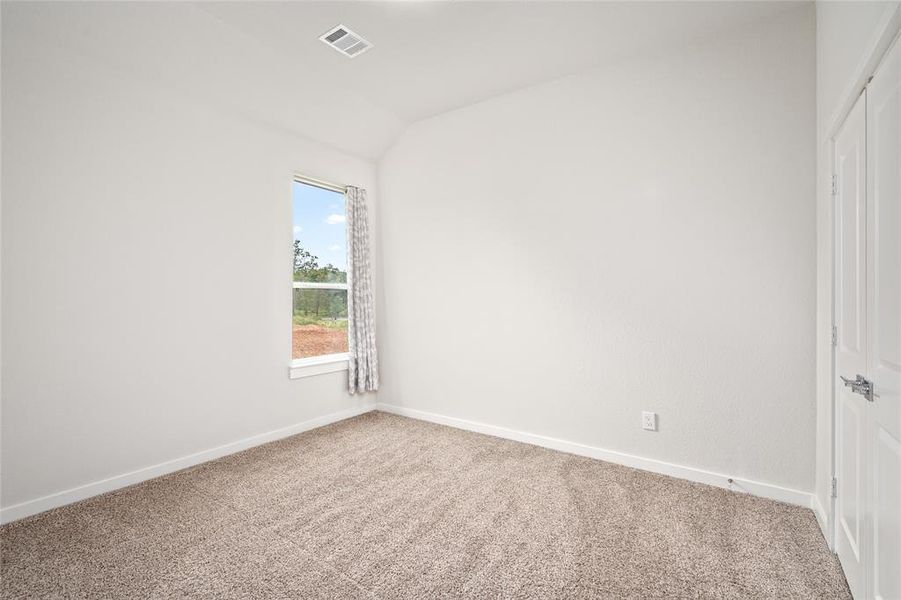 This is the second secondary bedroom.  Not yet decorated and is a blank canvas for your personalization.