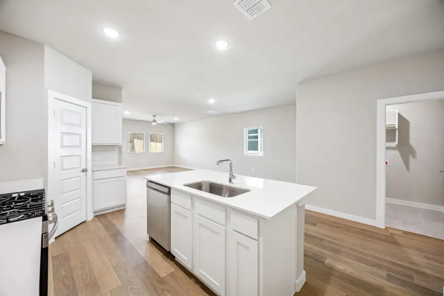 Kitchen in the Willow home plan by Trophy Signature Homes – REPRESENTATIVE PHOTO Kitchen in the Willow home plan by Trophy Signature Homes – REPRESENTATIVE PHOTO