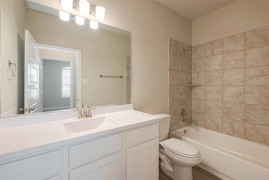 Furnished interior view inside a new home in Rollingbrook Estates, Baytown (Image 9). Furnished interior view inside a new home in Rollingbrook Estates, Baytown (Image 9).