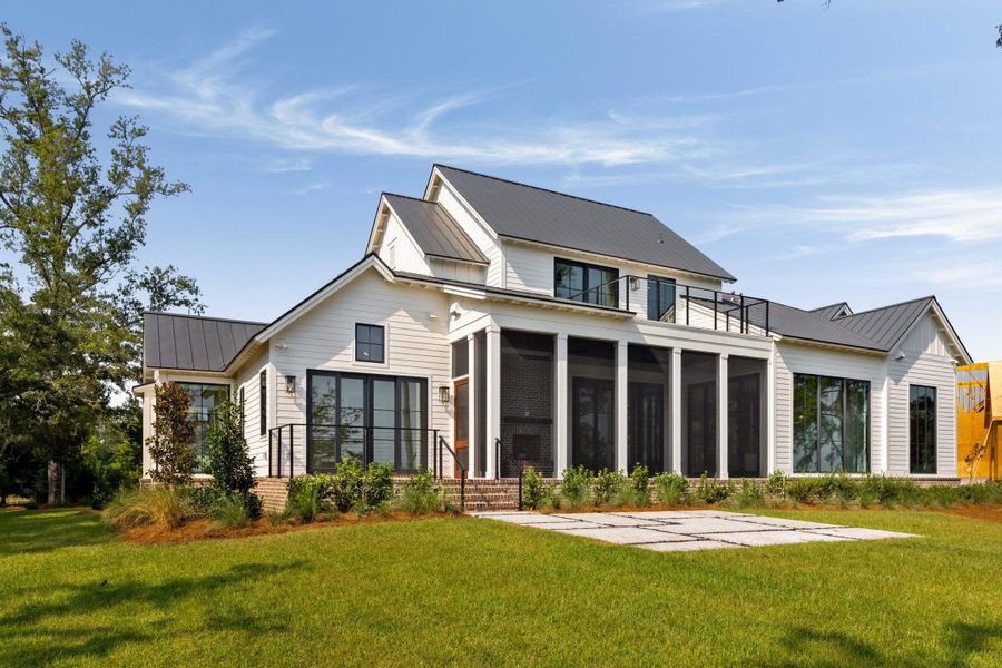 Front exterior of a new home in , Ravenel, SC, highlighting curb appeal (Image 31).