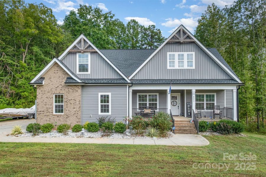 Front exterior of a new home in , Clover, SC, highlighting curb appeal (Image 20).