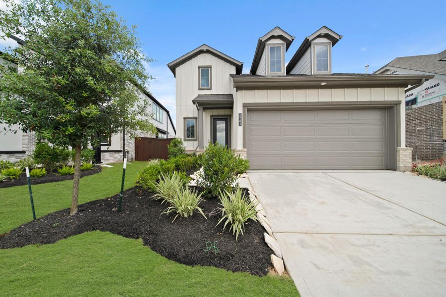 Front exterior of a new home in Meridiana 40', 65', Iowa Colony, TX, highlighting curb appeal (Image 1). Front exterior of a new home in Meridiana 40', 65', Iowa Colony, TX, highlighting curb appeal (Image 1).