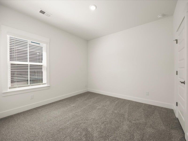 Spacious, unfurnished interior of a new home in The Coves at Lakes of Cane Bay, Summerville (Image 40). Spacious, unfurnished interior of a new home in The Coves at Lakes of Cane Bay, Summerville (Image 40).