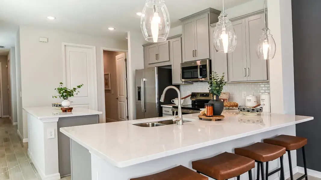 Furnished interior view inside a new home in Westview Community Group Page, Kissimmee (Image 10).